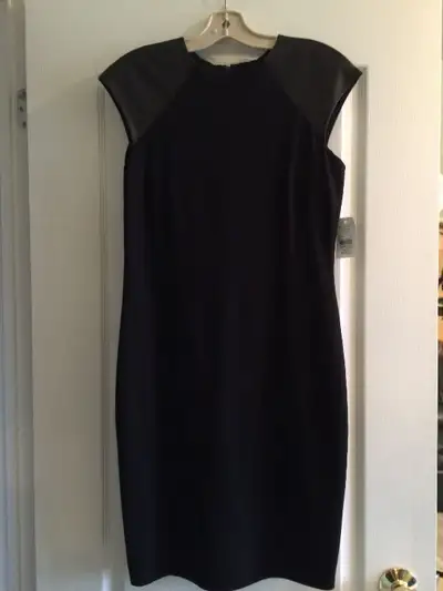 Selling new Ralph Lauren dress retailed for over $200 (tags still on) - size 6, black, perfect for t...
