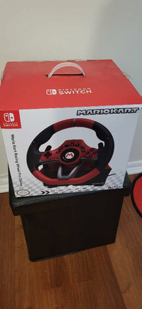 Nintendo switch; Mario Kart Racing wheel pro deluxe 