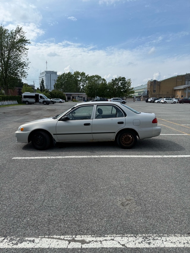 Toyota Corolla CE 2002 — photo 3