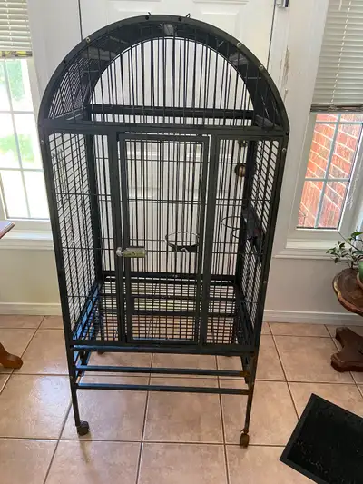 Large dome shaped top bird cage for sale . The cage is fairly used but still has lots of life left a...