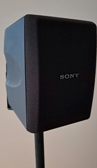 Sony Model SS-SR15 Surround Sound Speakers with floor stands.