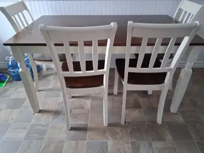 Kitchen table and 4 chairs 1 yr old. Bought for 799., View more