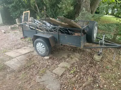 I'm selling a used utility trailer, inside dimension are 5FT W x 8 Feet Long. This trailer is in goo...