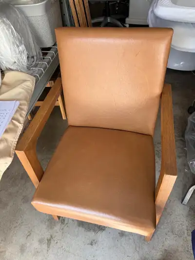 $80 each , I hav e2 of them This tan-coloured armchair features a sleek, modern design with a sturdy...