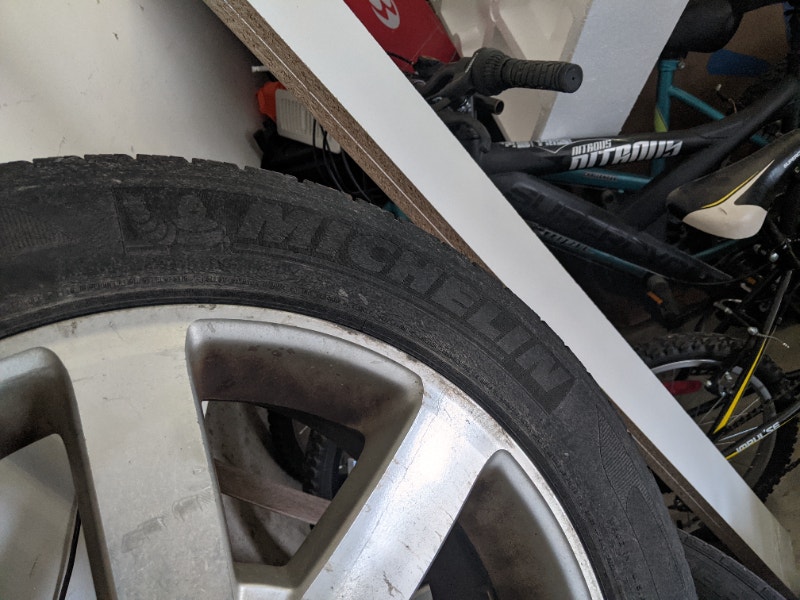 Original 17" Nissan alloy wheels with 215/55/17 tires Tires & Rims