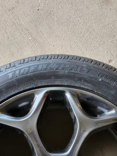 4 tire and rim set. OEM rims. 1 summer season on tires. Rims in good shape. Comes with TPMS installe...