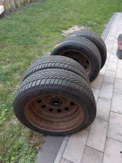 225 / 55R18 Used one season for occasional driving. Rims and storage rack included. Selling for in l...