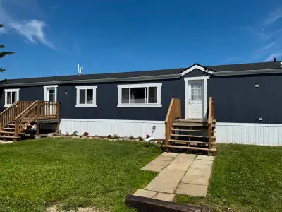 Newly renovated larger modular home situate on 80 acre parcel in Leduc County. Easy access to Edmont...