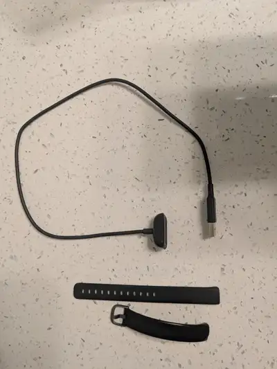 Selling Fitbit Luxe Charger and Large band Charger is used and in great condition. Pick up only in M...