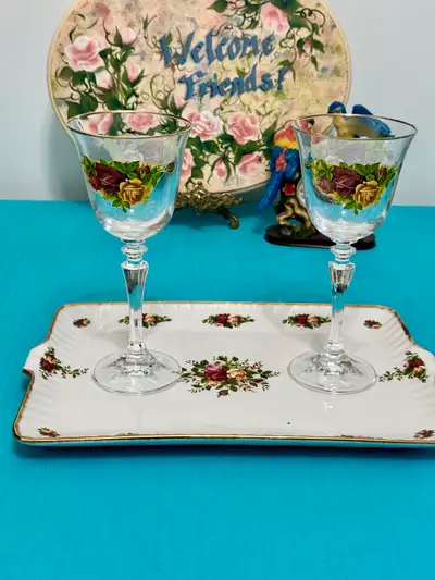 $35 each Tall Wine glass ( 8 available ) . Tall glass Old Country Roses Royal Albert- $25 each water...