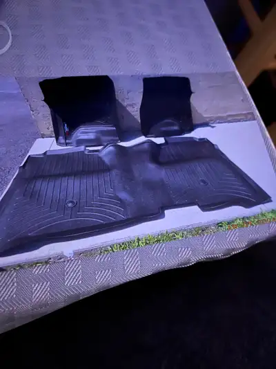 Complete set excellent condition weather tech mats. Fits 2015 - 2020 Silverado or GMC Rear mat is fu...