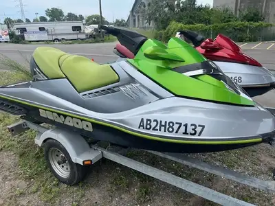 2 SEADOOS -GREEN 2005 RXT SUPERCHARGED. 120 HOURS -RED 2004 GTI 125 hrs BOTH WITH NEW BATTERIES ,STA...