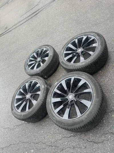 Rims and winter tires for Tesla 255/45/19 continental winter tires 80% tread. No issues 19 inch rims...