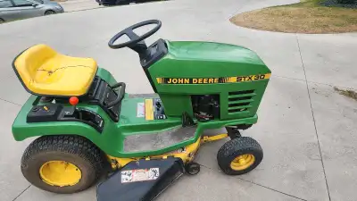 Great condition John Deere with 32inch mower deck. Model STX30, with Kohler 9Hp O.H.V engine New bat...