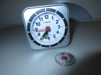 Cosmo travel alarm clock/ does not come with battery.Pre-owned, View more