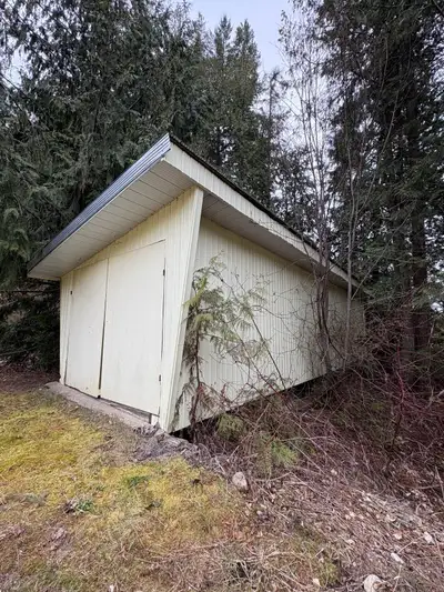 Custom made 40 ft. storage shed on skids for sale. Asking $21,500 or Best Offer. Presently hooked up...