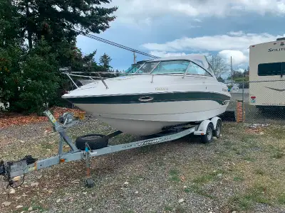 Larson Hampton 1998 24 foot with dual axle EZ load trailer. 5.0 merc and alpha 2 leg. It comes with...