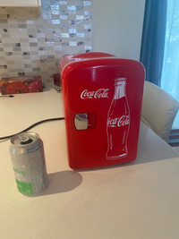 Small Coke Fridge holds approx. 6 cans . Not working properly 