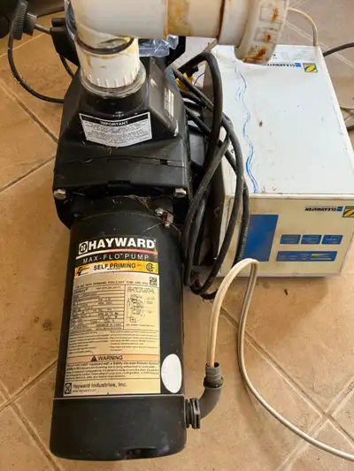 In ground pool pump, filter, 250 000 btu heater, salt/chlorinator system, Aqua Genie skimmers, 4 ste...