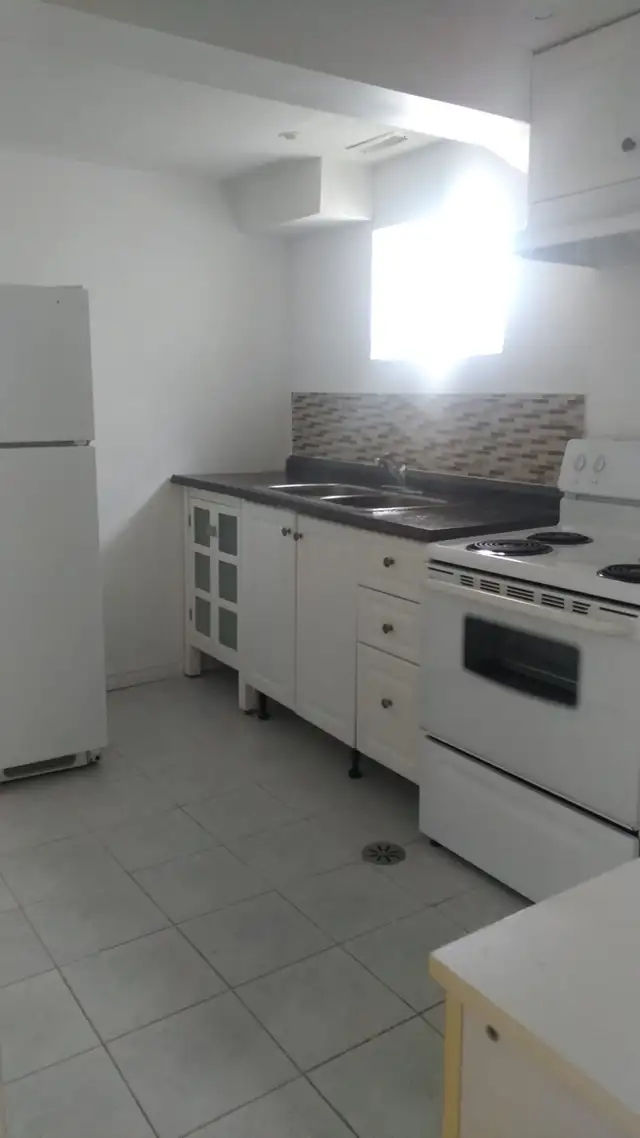 Available immediately 2 room basement apartment