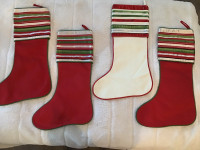 Like new…. all 4 Crate and Barrel Christmas stockings