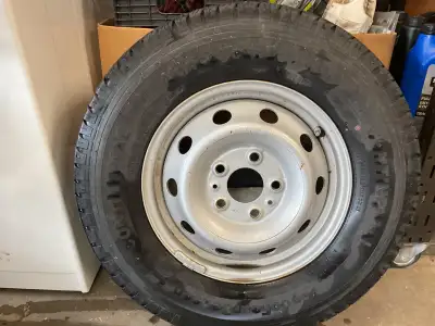 Tire on Promaster rim, size is 225/75/16. Tire is like new, has a plug in it.