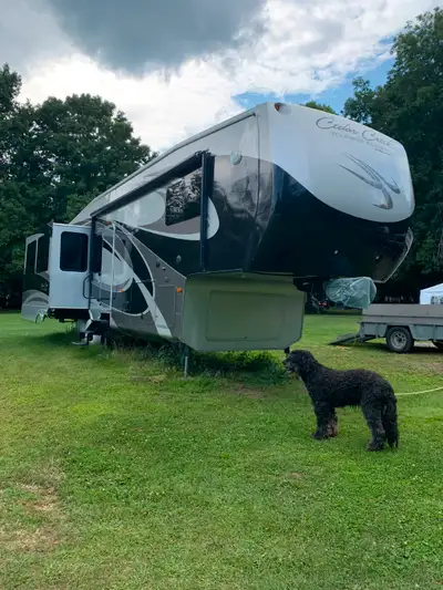 Must sell, $45,000 or best offer. 40 ft fifth wheel with full body graphic paint. 6 point hydraulic...