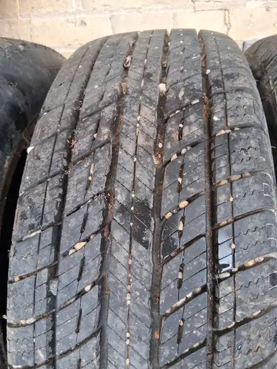5 -P215/60r16 uniroyal touring all season tires on mag rims Used for one month. $125per tire One don...