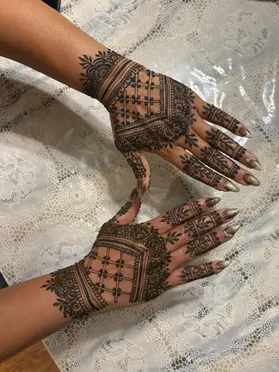 The price for threading is $5, waxing of full arms, under arms, full legs is $40, head massage half...