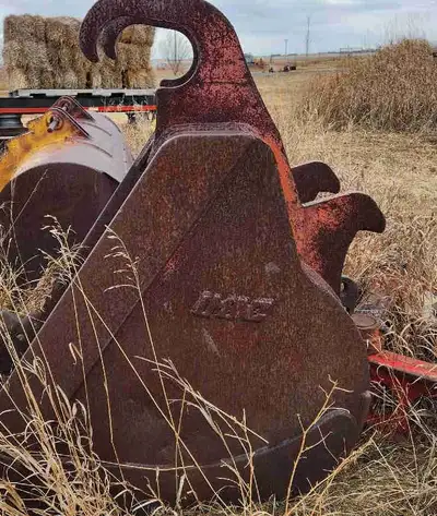 Industrial equipment/accessories: (1) scoop/excavating bucket (1) beam (1) bucket No history as to w...