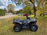 Polaris ATV and  10 ft. Enclosed trailer for ATV and snowmobiles