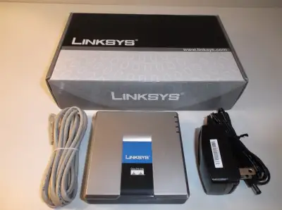 LINKSYS Phone Adapter with Router SPA-2102, View more
