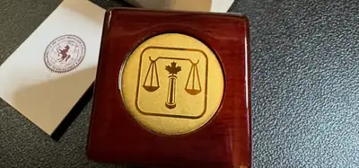 Engraving might be related to Canada Legal Low Judge System or Library services in the Department of...
