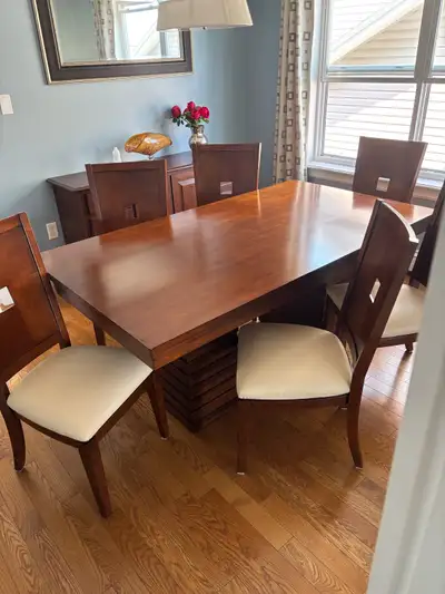 Real wood dining table with 6 wood/leather chairs, View more