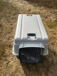 Large dog kennel - like new condition 