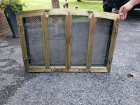 Brass and glass fireplace door insert