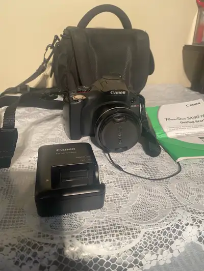 Canon PowerShot SX40 HS:  12.1 MP Digital Camera & Charger/Case , View more