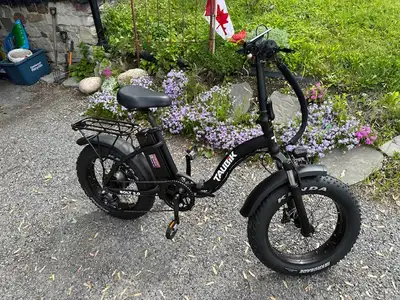 A Taubik Bolt 2.0 Ebike - Foldable Step Thru Style 20" Fat Tires. In ‘Brand New’ condition. Driven o...