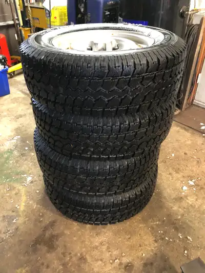 Total Terrain Snow Tires on Chevy 1500 rims with chrome caps. Lot of tread remaining. $500 OBO