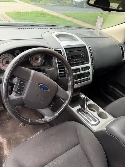 Silver 2007 ford edge - selling as is, still runs and has had a long life. Comes with a set of winte...
