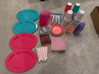 There are 4 serving platters, 5 pink see thru dishes, 18 little popcorn/treat cups We paid $15 each...