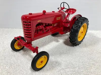 1/16th MASSEY-HARRIS Mustang produced by SCALE Models in 2002. Nicely detailed die-cast replica with...