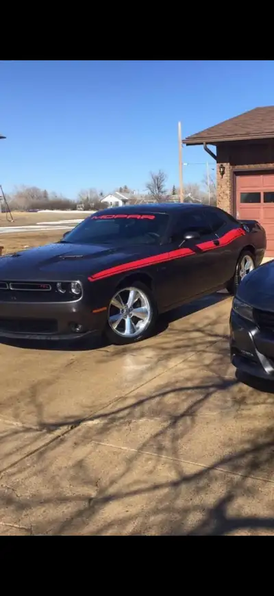 2016 challenger RT 5.7 hemi. It has 94,000 km. Great car nice shape it has been straight piped (stil...
