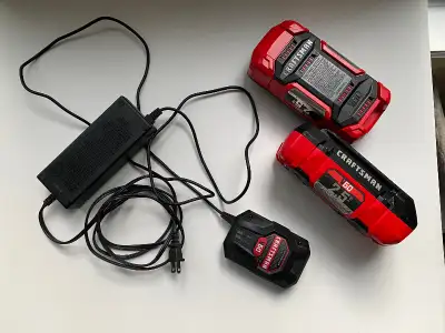2 Craftsman rechargeable 2.5 AH V60 batteries and charger. Leaf Blower ingested string and damaged f...