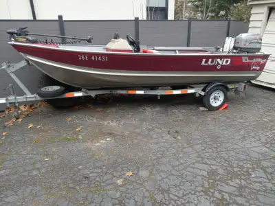 THIS BOATS IN GREAT SHAPE A GREAT BOAT MOTOR AND TRAILER COMBO FROM LUND. ITS 16 FEET LONG AND 73 IN...