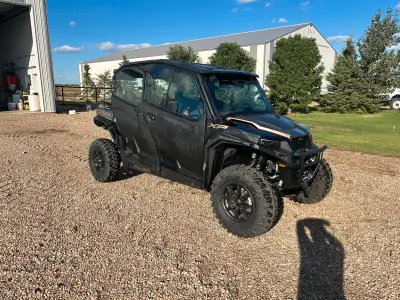 2023 Polaris General Side by side. 1000cc Full cab with hard doors, heater, windshield wiper with fl...