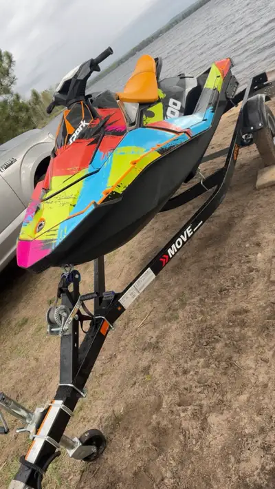 Selling my very clean 2014 Seadoo Spark. On a MINT Condition Seadoo Move Trailer. It currently has a...