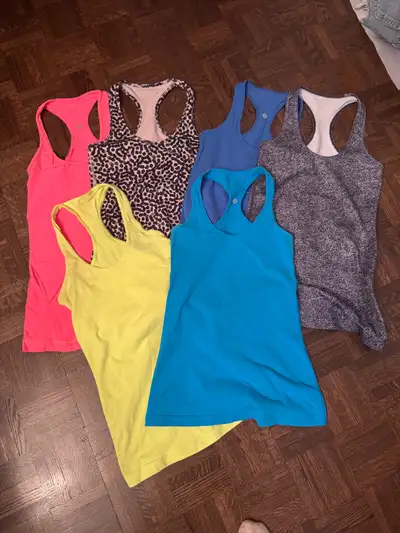 Lululemon Cool Racer back tank Size 4 6 total for 15$ each Take all 6 for 75$ (1 free!) Excellent us...