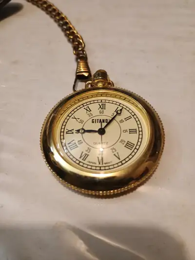 Handsome pocket watch with leather carrying case. As part of an estate sale, it's being sold 'as is'...