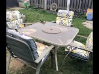 Patio table, chairs and cushions 